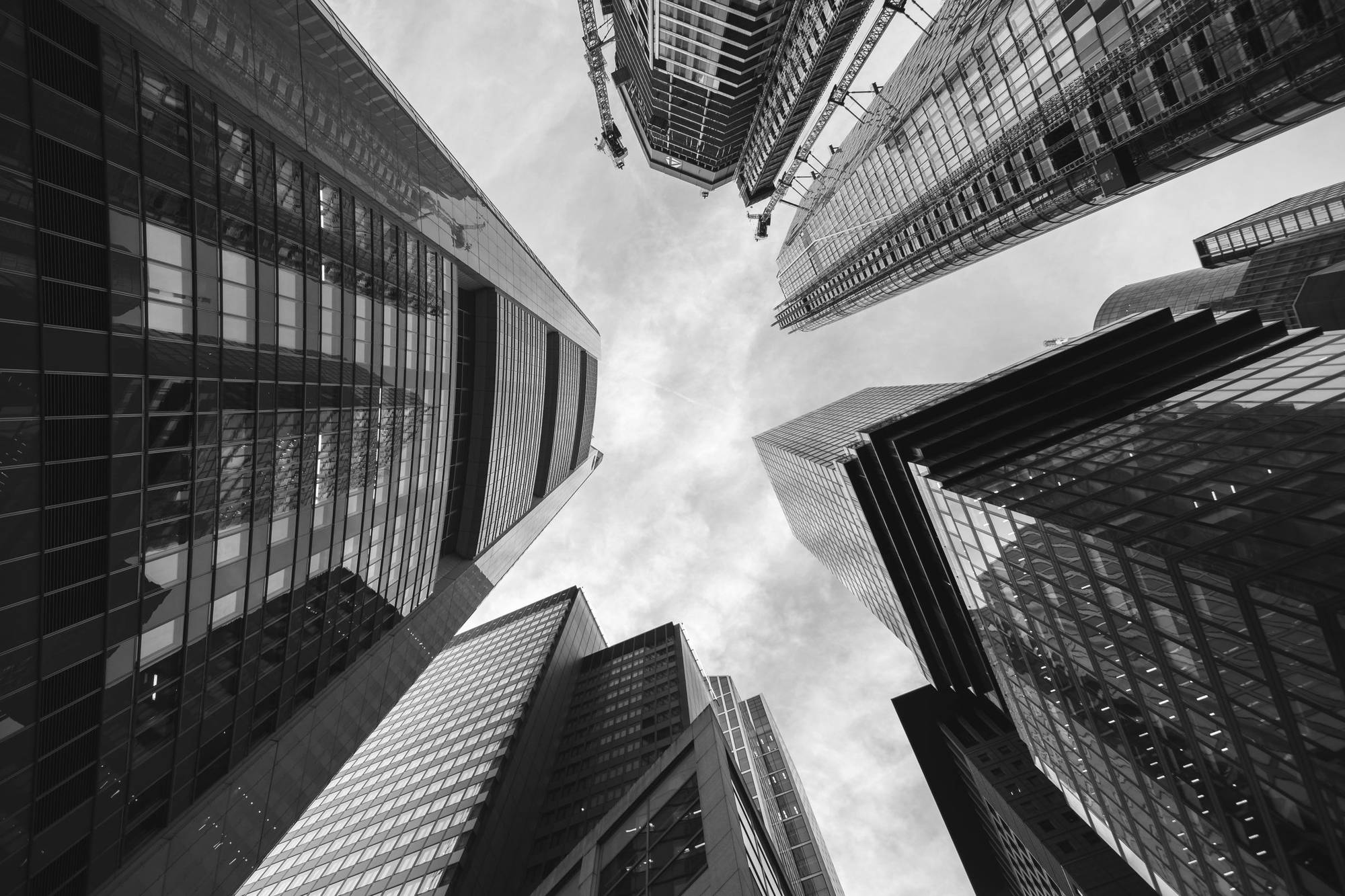 Glass office towers seen from street level
