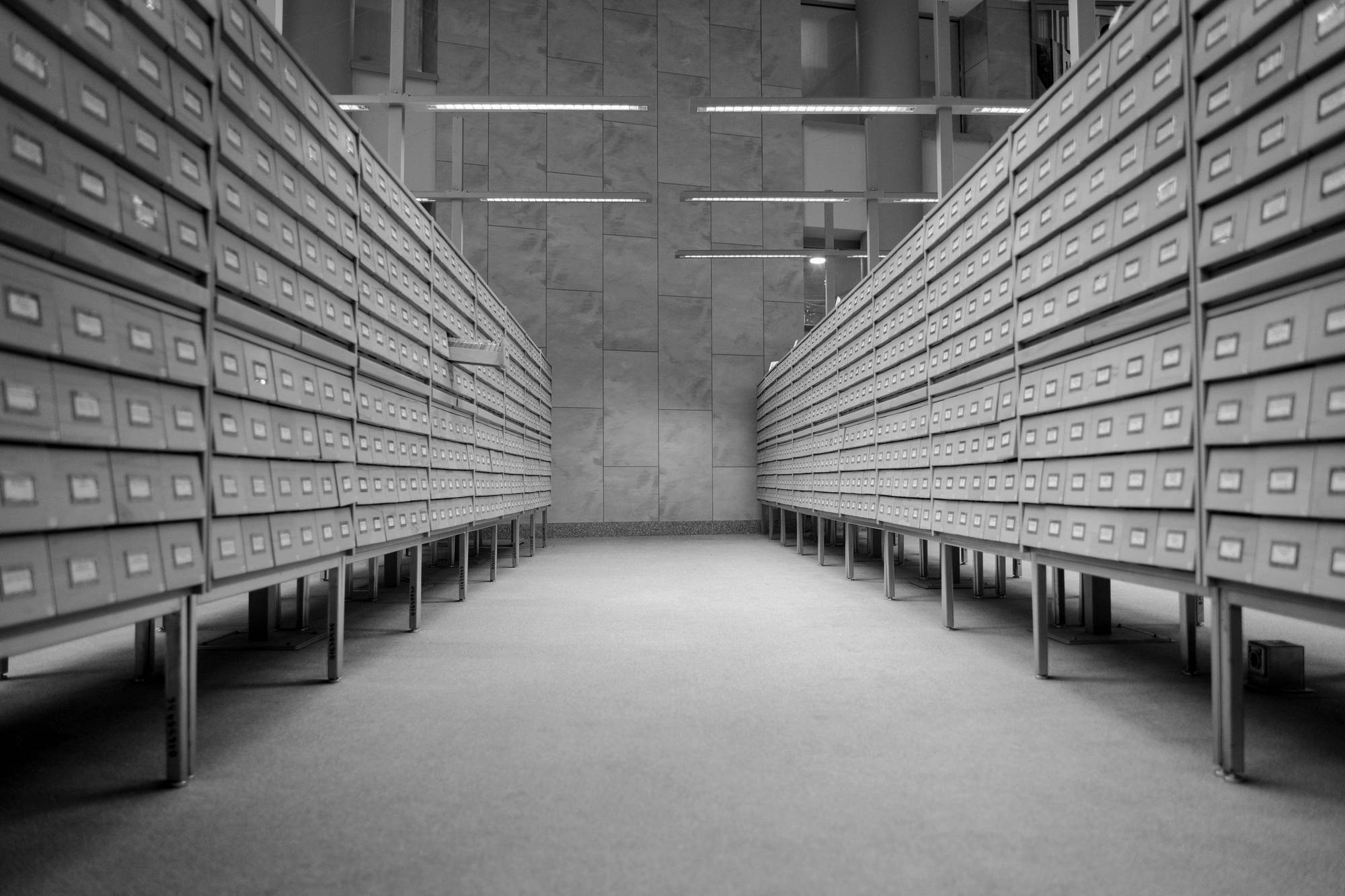 A long corridor of archive drawers