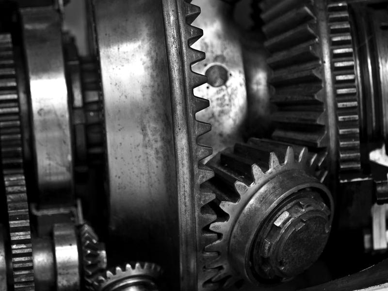 Meshing gears inside a working machine
