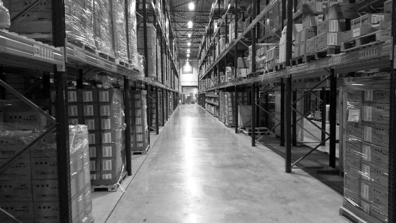 A warehouse aisle lined with racking