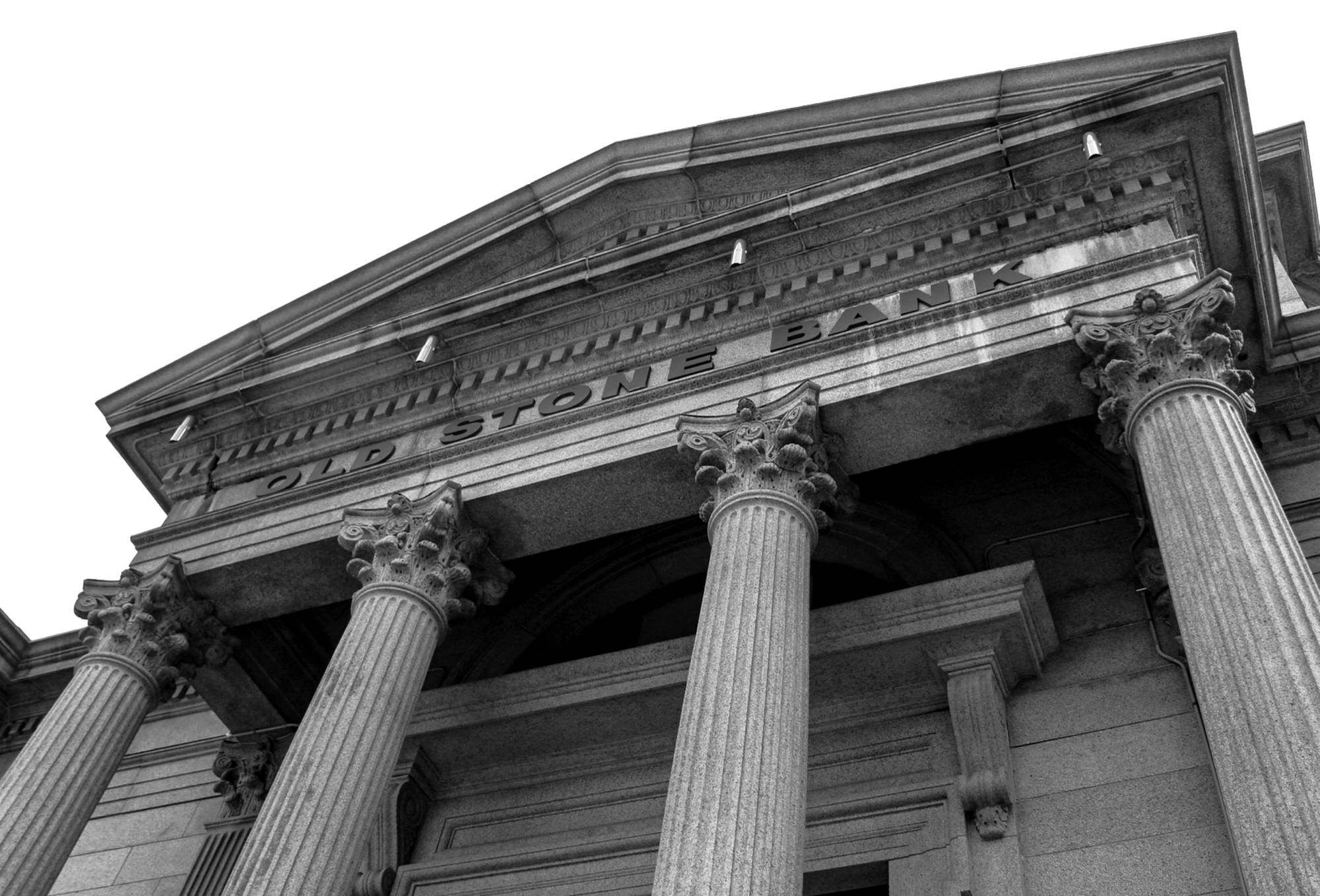 The columns and pediment of a stone institution