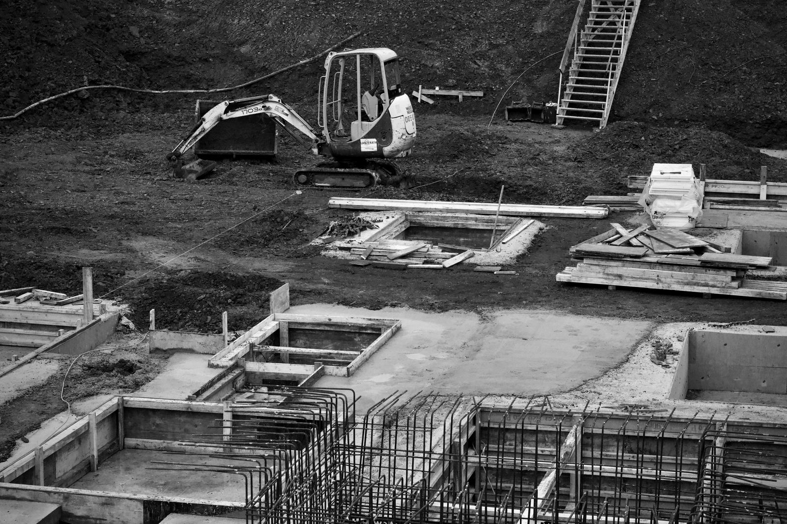 An excavator working on building foundations